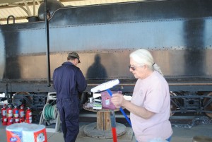 Lee Conner and Ellen Dodds prepare the tender for lettering